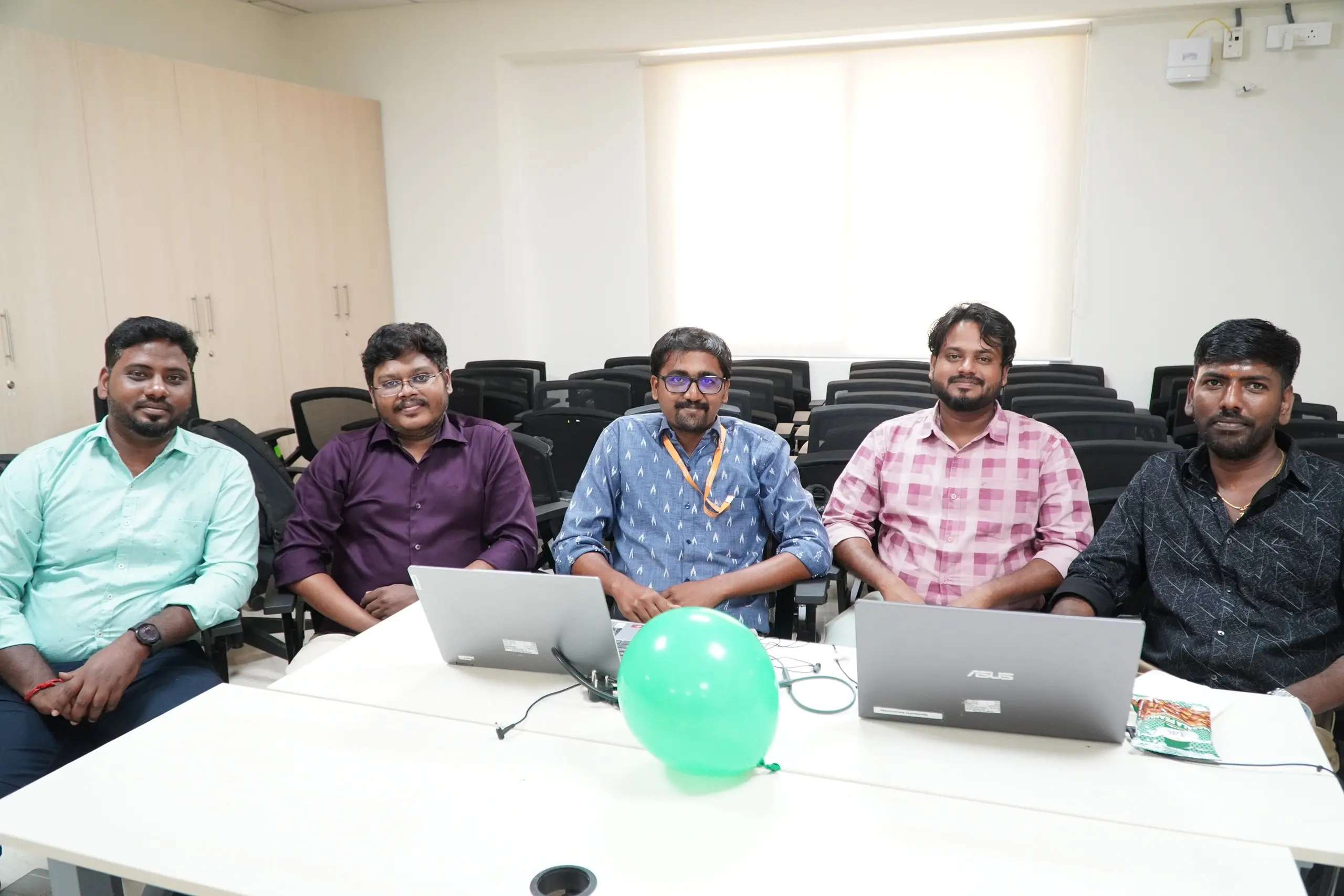 Prakash Perumal with Colleagues at a Workplace Gathering