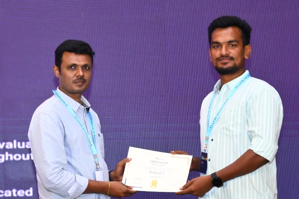 Prakash Viswanathan Receiving an Award from Vijay