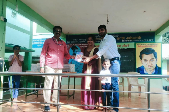 Praveenkumar receiving certificate with family