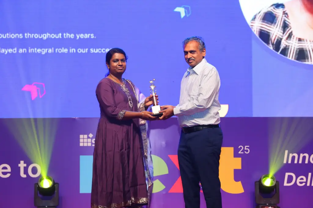 Priyanka Subbraj Receiving an Award at NEXT Event