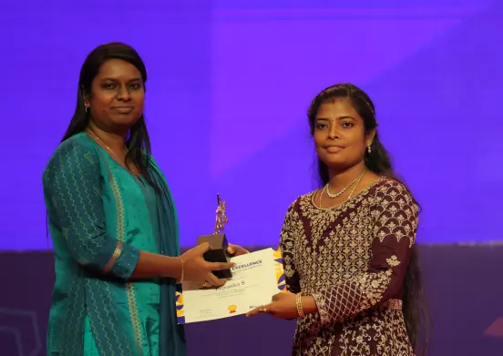 Priyanka Subbraj Receiving an Award