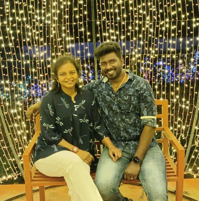 rajendran murugan with his wife in light settings