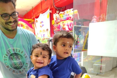 Ravi Kumar Gurunathan with children outside