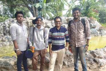 Ravi Kumar Gurunathan with friends outside