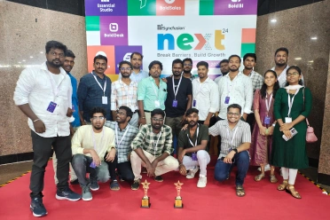 Ravi Kumar Gurunathan with office team members at event
