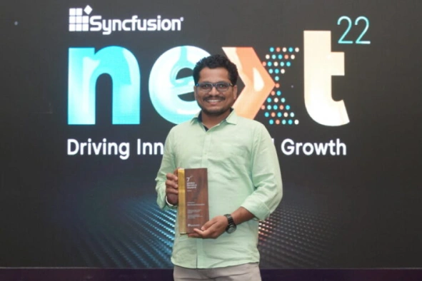 Ravi Kumar Gurunathan with received award at Next event