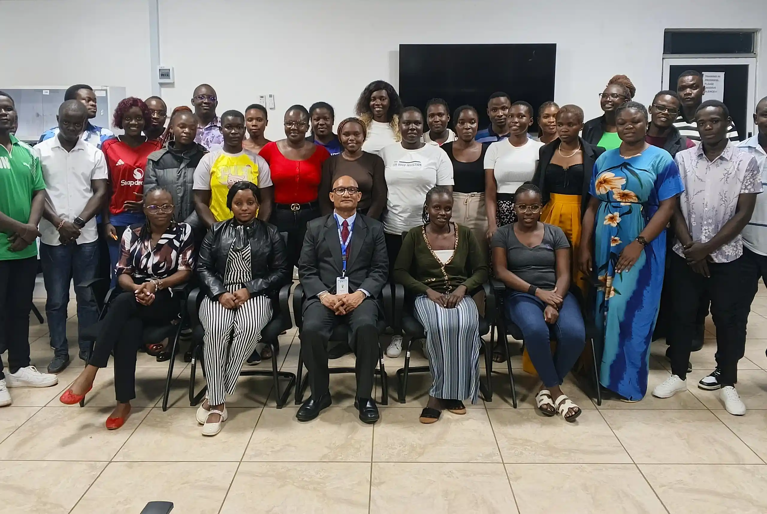 Rudolph Melvin Mathias with Colleagues