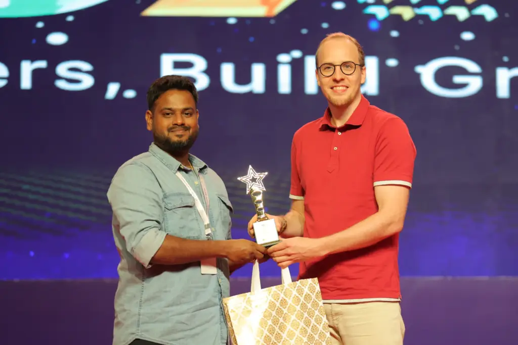 Sarathkumar Venkatesan Receiving an Award at NEXT Event