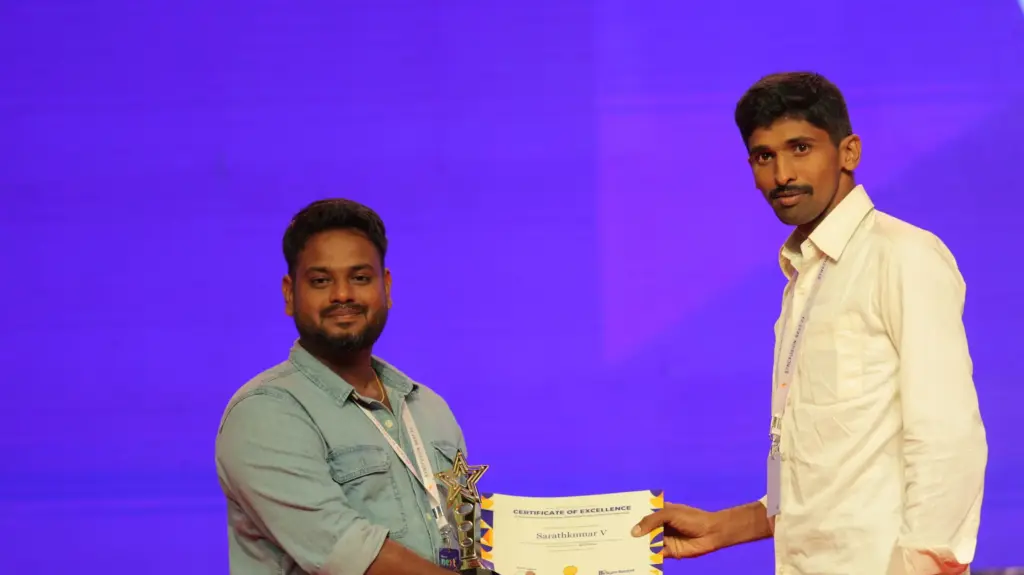 Sarathkumar Venkatesan Receiving an Award