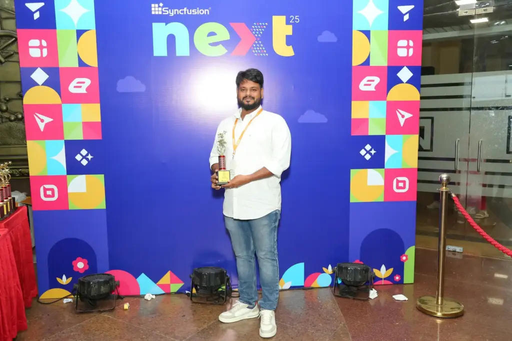 Sarathkumar Venkatesan Holding an Award