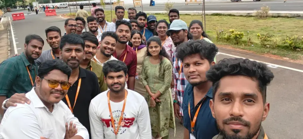 Sarathkumar Venkatesan with Colleagues at Event