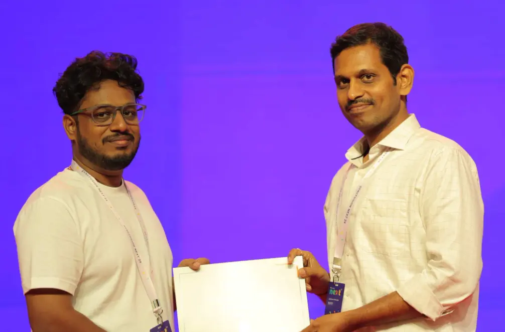 Saravanan Madheswaran Receiving an Award