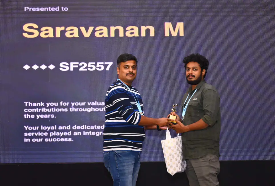 Saravanan Madheswaran Receiving a Twelfth Year Service Award