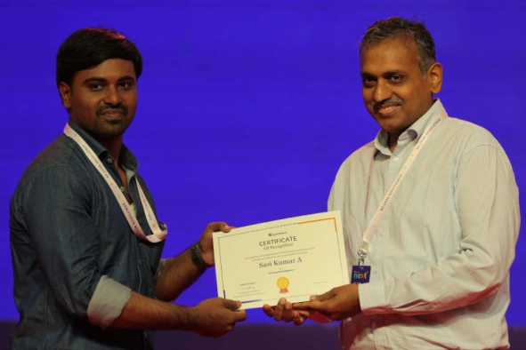 Sasi kumar receving certificate from davis