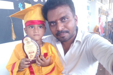 Satheesh Kumar Kalimuthu With Child Achievement