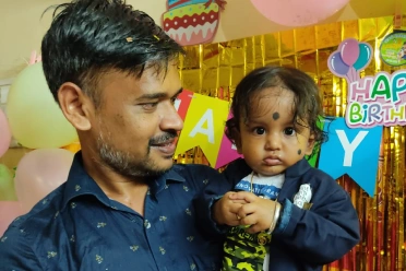 Senthilkumar with his baby