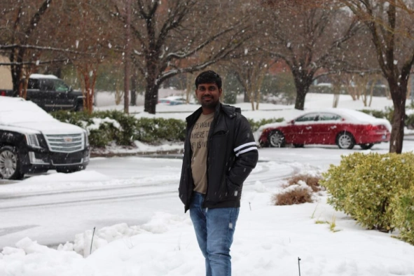 Sheik Syed Abthaheer Mohamed Ariff with snow