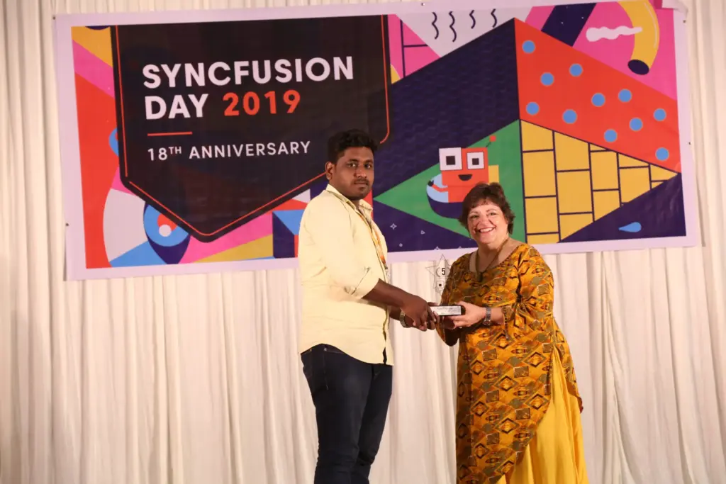 Silambarasan Ilango Receiving Award At Syncfusion Day
