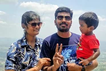Suriya Murugan with her family in a mountain