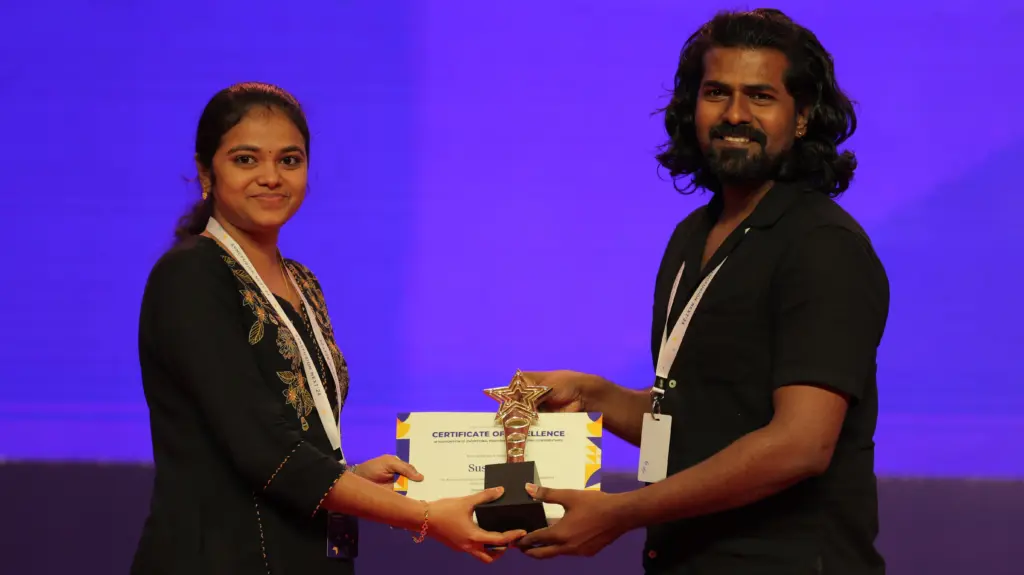 Susmitha Sundar Receiving Award