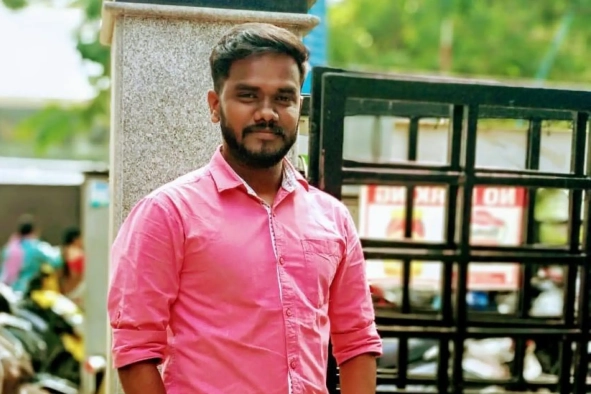 Thavasianand Sankaranarayanan Standing Outside Office
