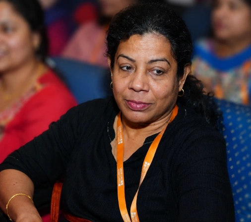 Usha Clementine Henry sitting in next event