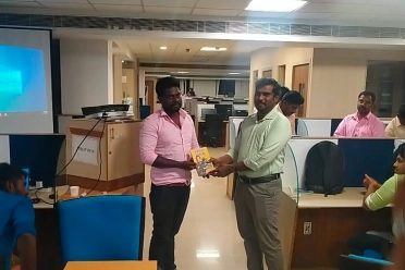 Vijay Raja Receiving Appreciation From Colleague