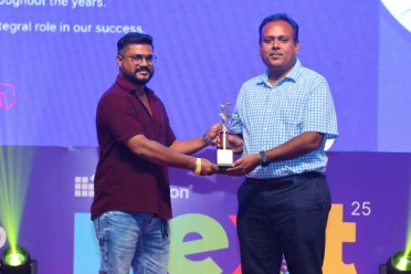 Vijayakumar Mariappan receiving award at Next event