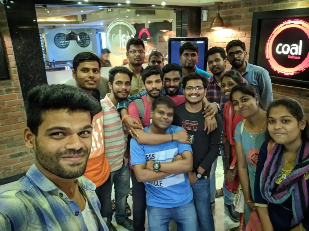 Vinoth srinivasan at resaturant with team