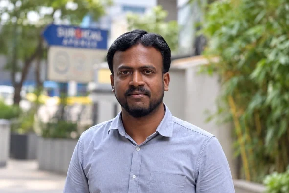 Kailash Ponnusamy standing in the office outside